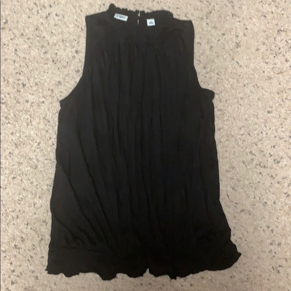 Black sleeveless blouse- goes with polka dot skirt